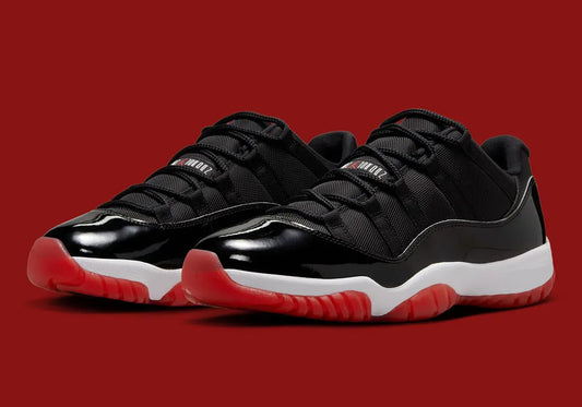 This sneaker’s got legacy. Black patent leather uppers, ballistic nylon, white midsoles and that iconic red translucent outsole